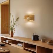 Euluna væglampe Tornado, guldfarvet