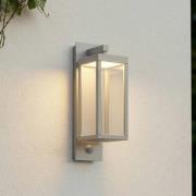 Lucande udendørs LED-væglampe Ferdinand, lysegrå, sensor