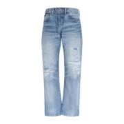 Ødelagte blå denim jeans