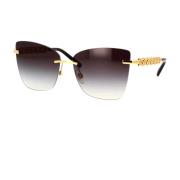 Stilfulde solbriller med guldramme og grå linser