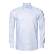 Lysblå langærmede skjorter