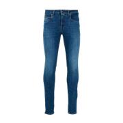 Blå bomuld jeans med knap og lynlås lukning