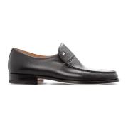 Elegante sorte loafer sko i gedeskind