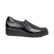 Sort patent slip-on sko