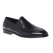 Loafers in black leather