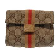 Pre-owned Canvas clutches