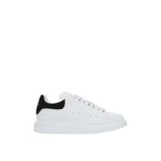 Hvide lave top sneakers med sort ruskind