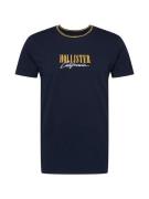 HOLLISTER Bluser & t-shirts 'VARSITY MAR'  natblå / gylden gul / hvid