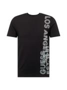 GUESS Bluser & t-shirts  sort / hvid