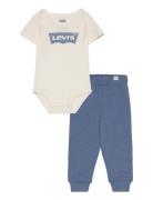 Levi's® Batwing Bodysuit And Joggers Set Levi's Blue