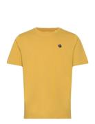 Loke Badge Tee - Regenerative Organ Knowledge Cotton Apparel Yellow