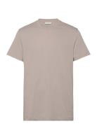 Logo Tape Tee Calvin Klein Jeans Beige