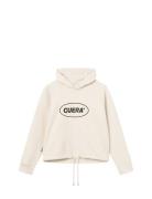 Cropped Merch Hoodie Cuera Cream