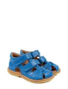 Classic Rub Sole Closed Two Velcro Pom Pom Blue