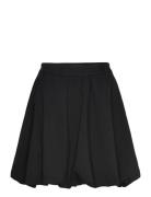Cmtailor-Skirt Is A Short Balloon Skirt In The Iconic Tailor Material ...