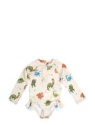 Vilje – Uv-Dragt 1-2 År – Dino Beach Filibabba Cream