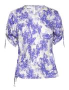 Joshua - Disrupted Flowers Tops T-shirts & Tops Short-sleeved Blue Day...