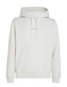 Monologo Hoodie Tops Sweatshirts & Hoodies Hoodies Cream Calvin Klein ...
