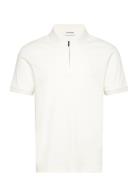 Liquid Touch Welt Zip Polo Tops Polos Short-sleeved Cream Calvin Klein